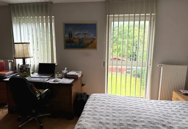 Zimmer mit Zugang zum Garten